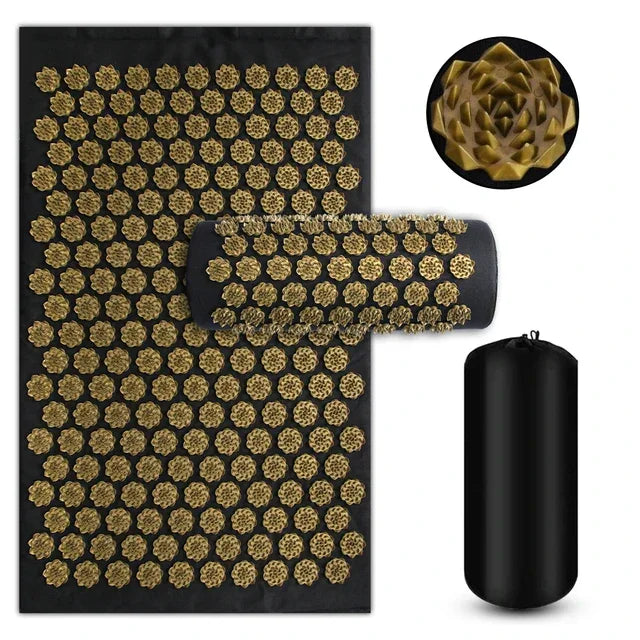 Acupressure mat and pillow set with gold spike lotus points on black fabric, includes carry bag