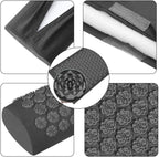 Black acupressure pillow and mat set with lotus-shaped spikes for pain relief and relaxation