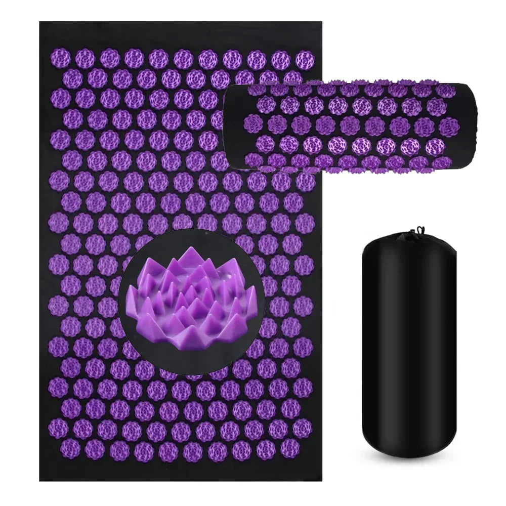 Purple acupressure mat and pillow set with lotus-shaped pressure points and black carry bag